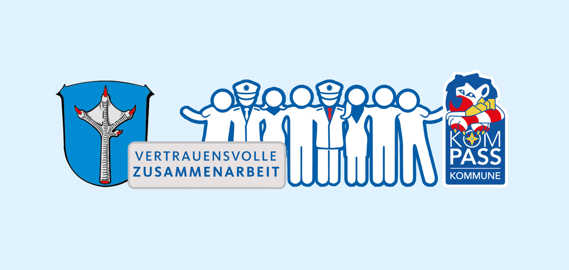 Kompass Header Auf dem Foto sieht man das Plakat zum Zusammenarbeit
