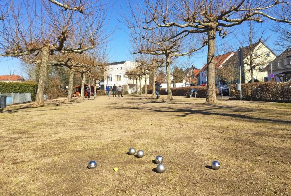 Petanque Spieler in der Grünen Mitte