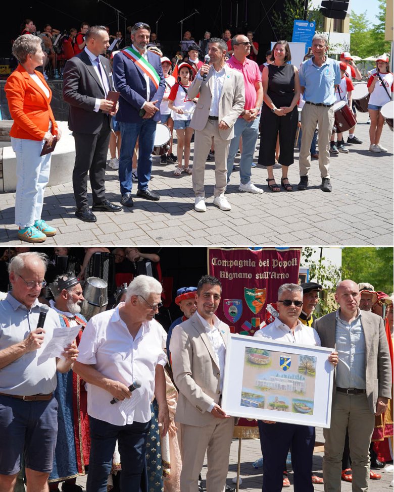 Die Vertreter der Partnerstädte bei der Eröffnung des Jubillaiumsjahrmarkts im oberen Foto; ein gerahmtes Bild wird als Geschenk an Bürgermeister Pullmann übergeben.