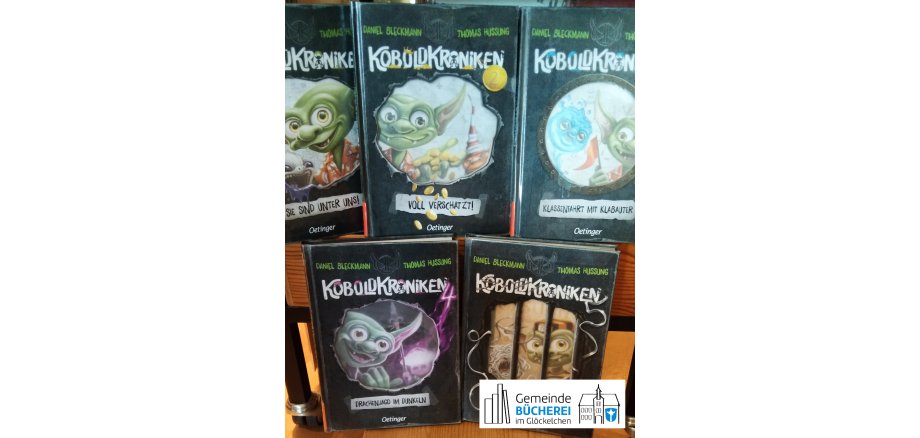 Im Foto zu sehen sind die bisher erschienenen Bücher der Reihe