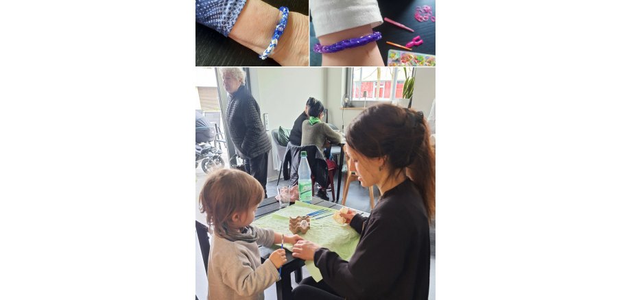 Auf dem Foto sieht man die Teilnehmer beim Basteln